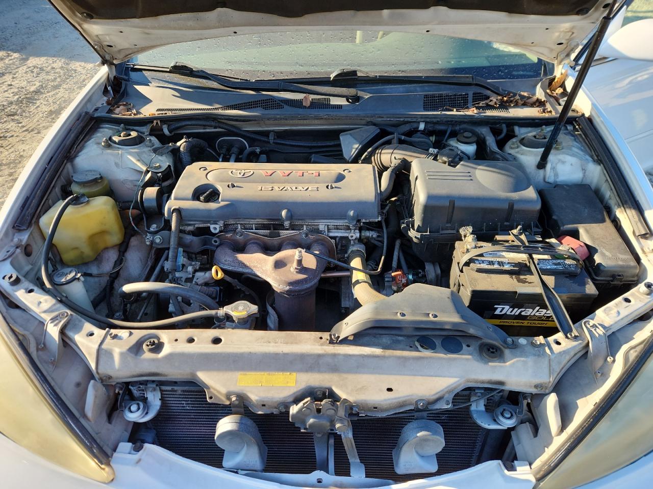 2004 Toyota Camry Le VIN: JTDBE32KX40254380 Lot: 82408945