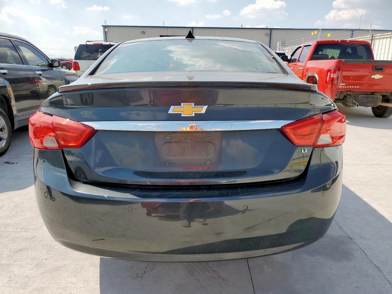 2014 Chev Impala Lt VIN: 2G1125S37E9262848 Lot: 84400975