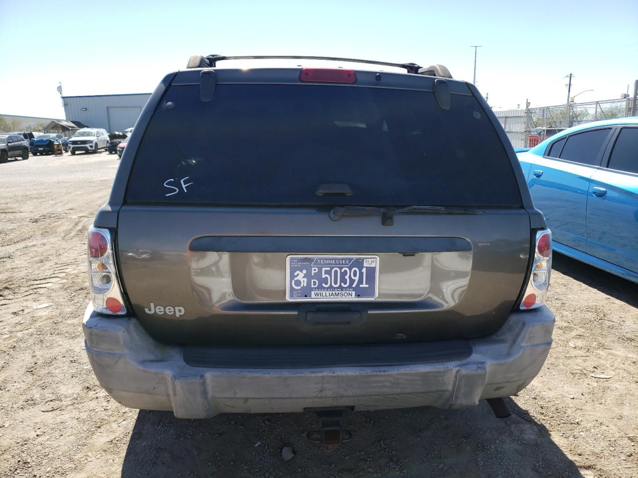 1999 Jeep Grand Cherokee Laredo VIN: 1J4GW58S6XC504412 Lot: 85901005