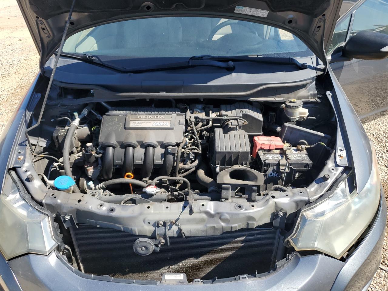 2011 Honda Insight Ex VIN: JHMZE2H77BS000539 Lot: 86087885