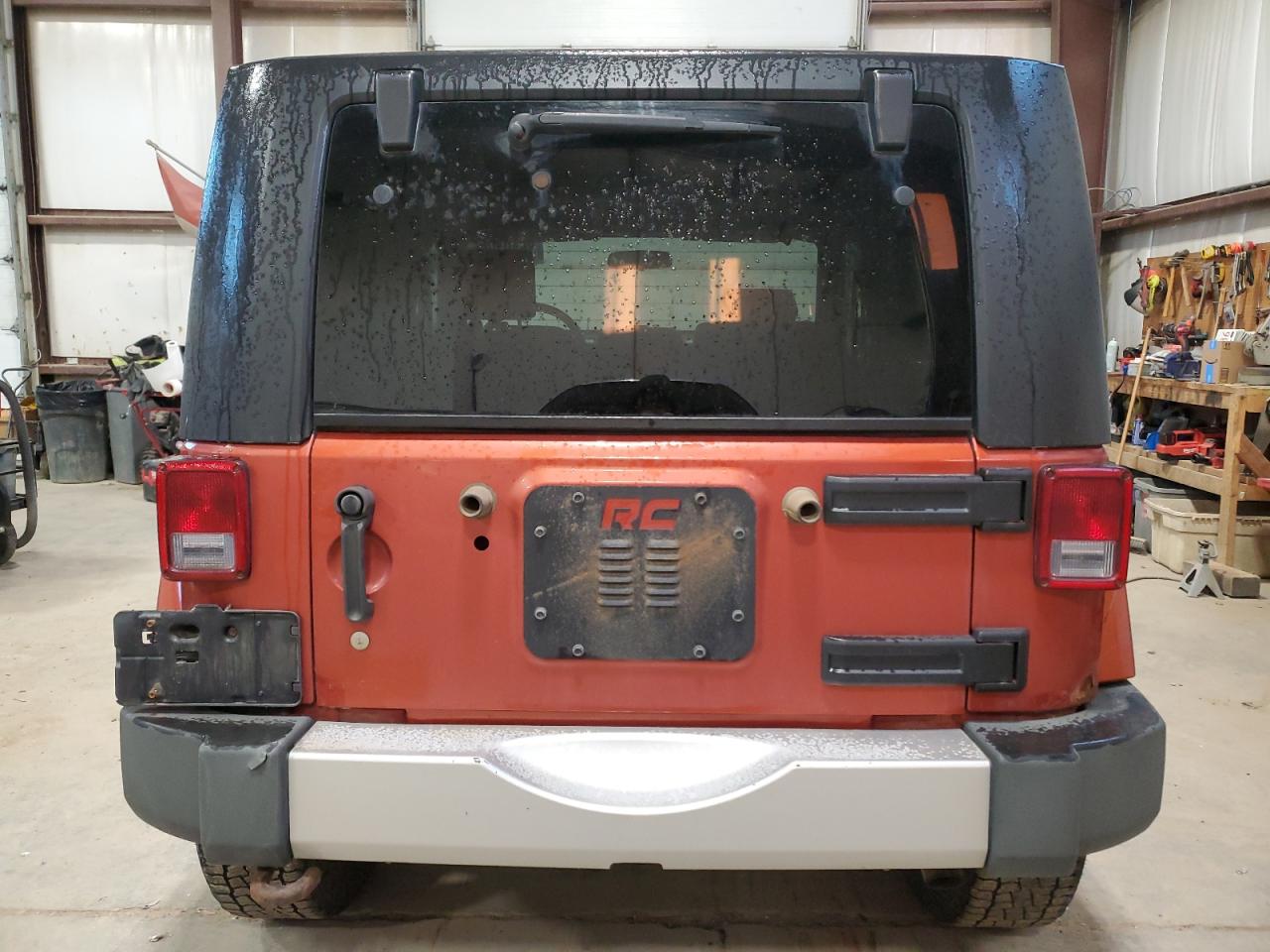 2009 Jeep Wrangler Sahara VIN: 1J4FA54189L723415 Lot: 86491095