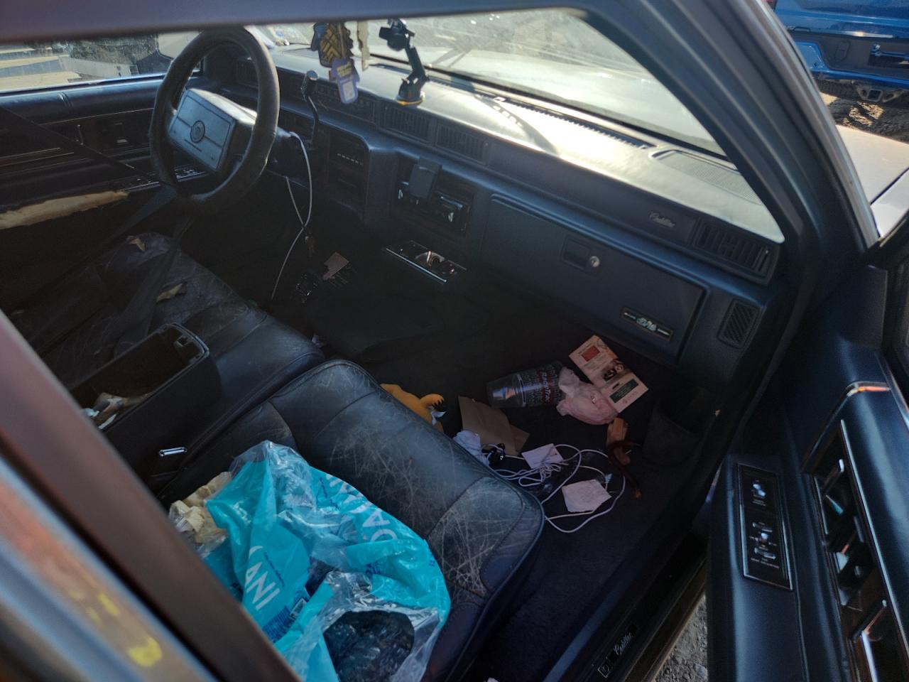 1990 Cadillac Deville VIN: 1G6CD5337L4319321 Lot: 82552015