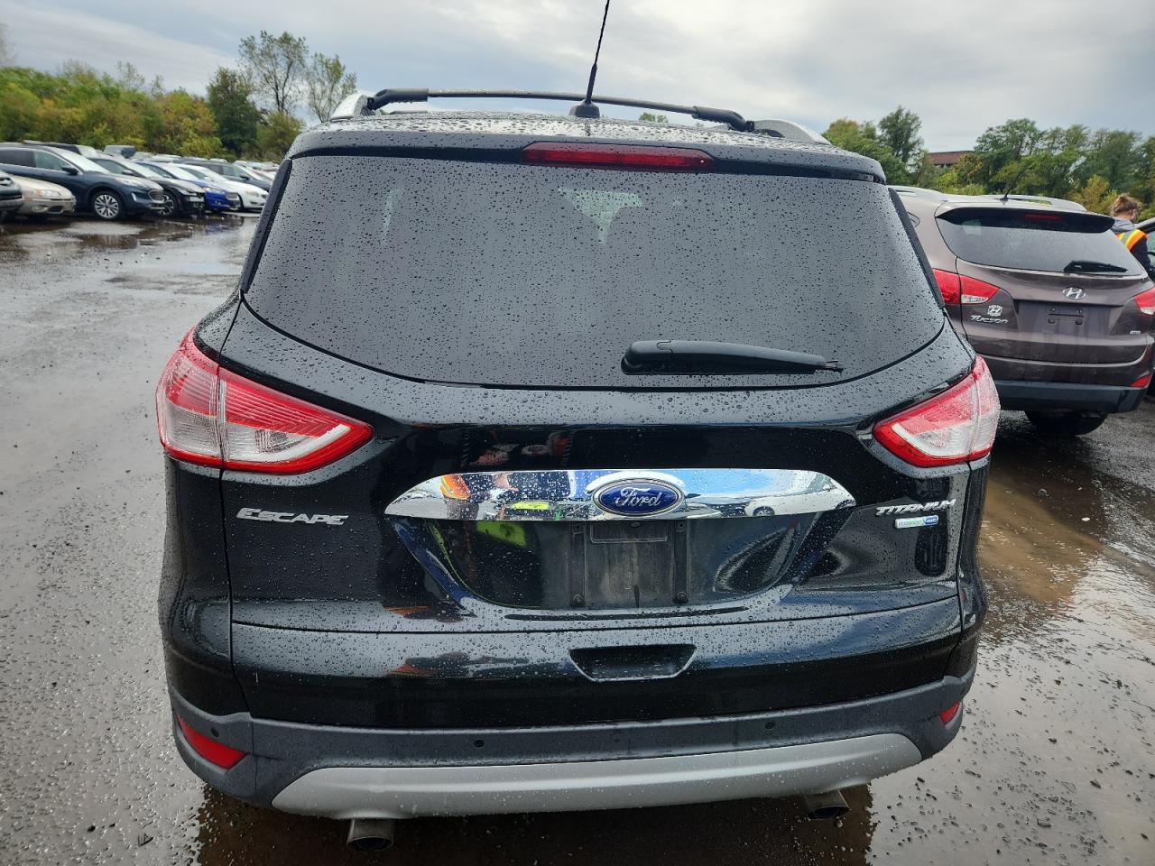 2014 Ford Escape Titanium VIN: 1FMCU9J92EUB20610 Lot: 85696205