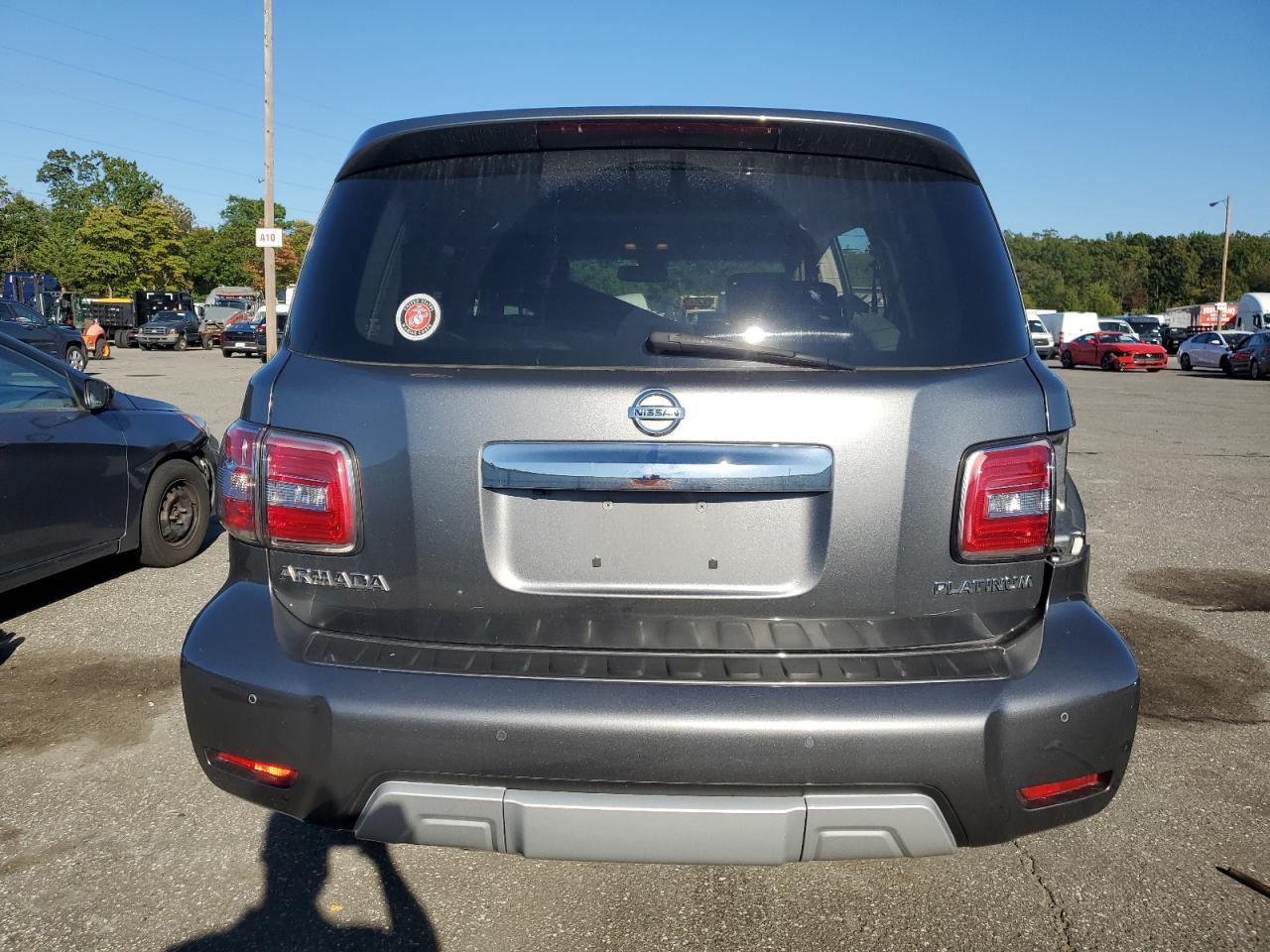 2017 Nissan Armada Platinum VIN: JN8AY2NE9H9703315 Lot: 81983885