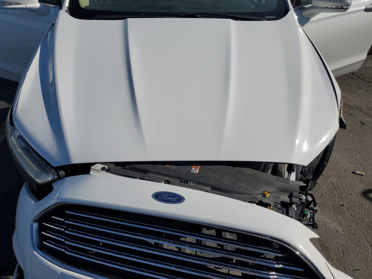 2015 Ford Fusion Se Hybrid VIN: 3FA6P0LU4FR196382 Lot: 86660965