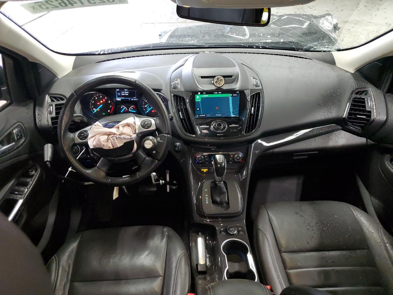 2016 Ford Escape Titanium VIN: 1FMCU0J96GUB91100 Lot: 82514625