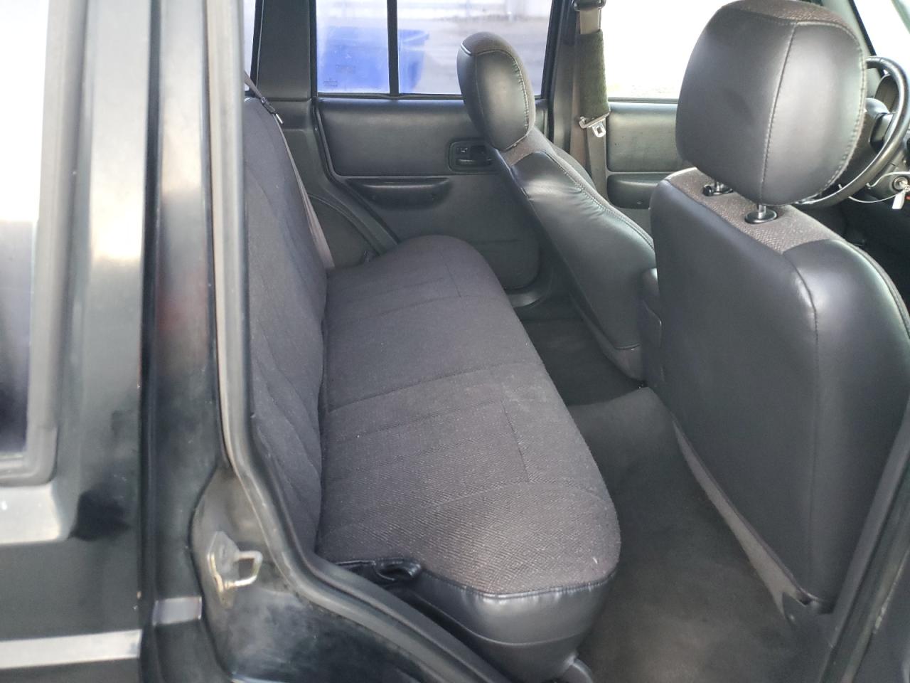 1999 Jeep Cherokee Sport VIN: 1J4FT68S2XL670579 Lot: 90354775