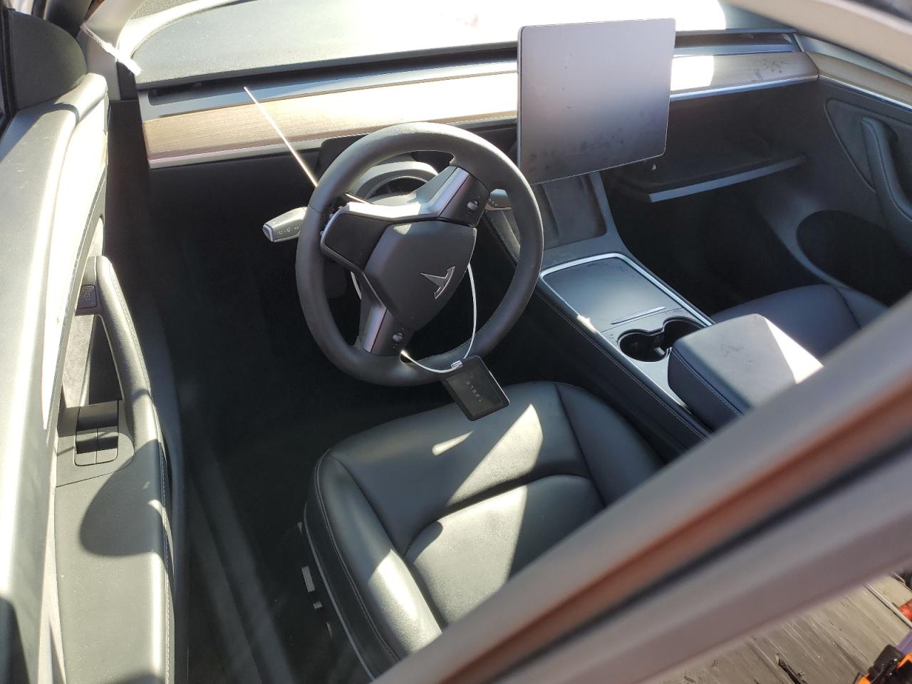 2023 Tesla Model Y VIN: 7SAYGDED1PF977065 Lot: 85851505