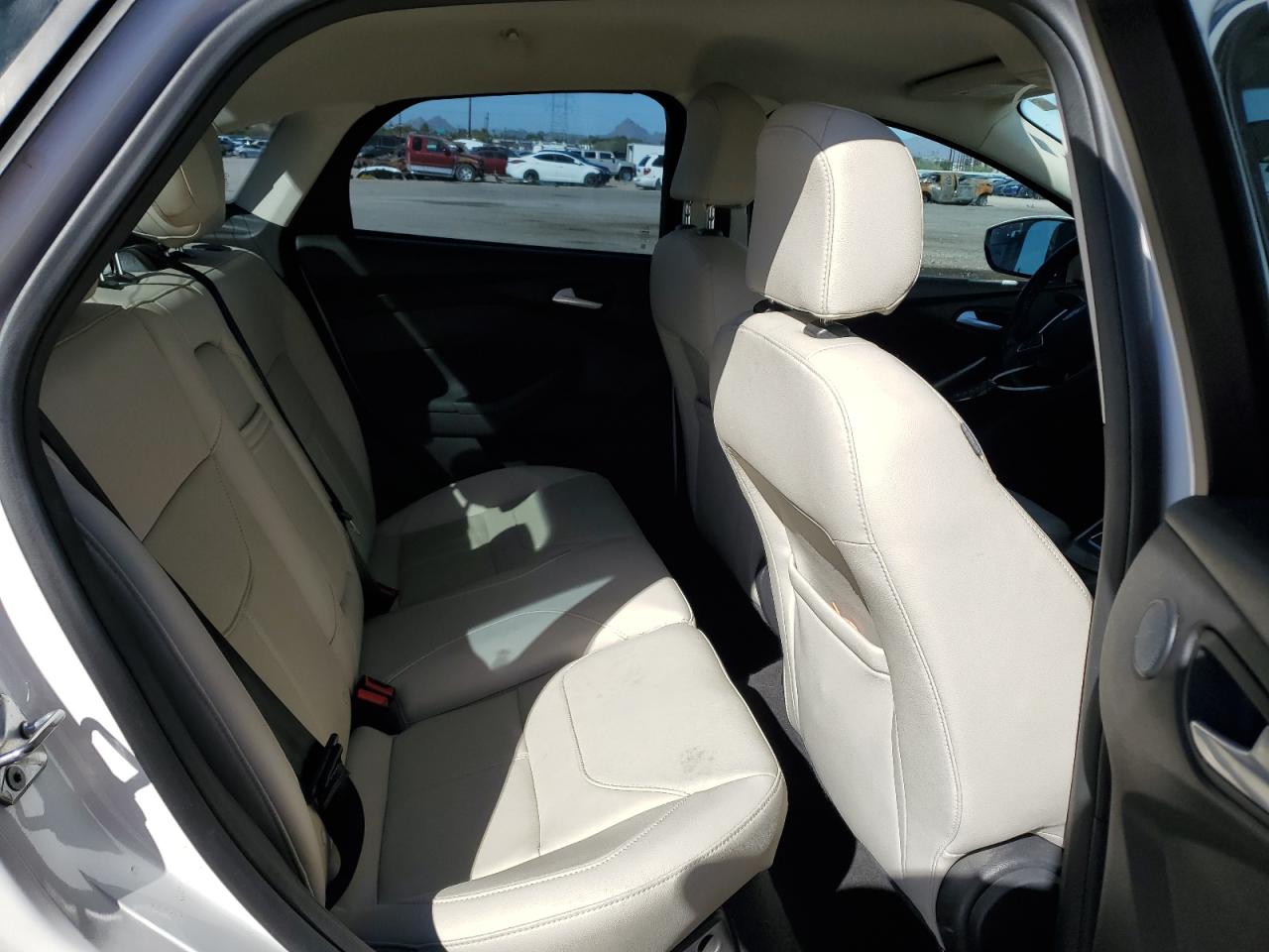 2016 Ford Focus Titanium VIN: 1FADP3J21GL230515 Lot: 85524355