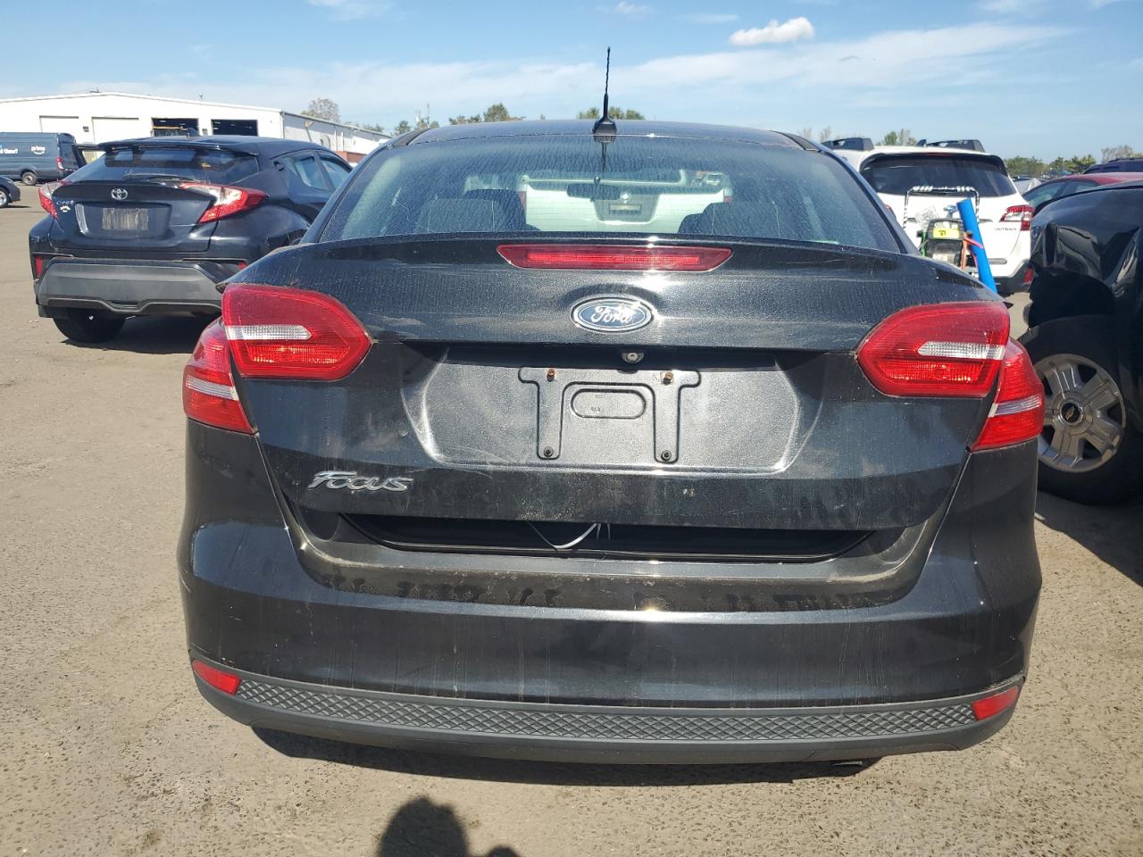 2015 Ford Focus S VIN: 1FADP3E27FL200427 Lot: 84943955