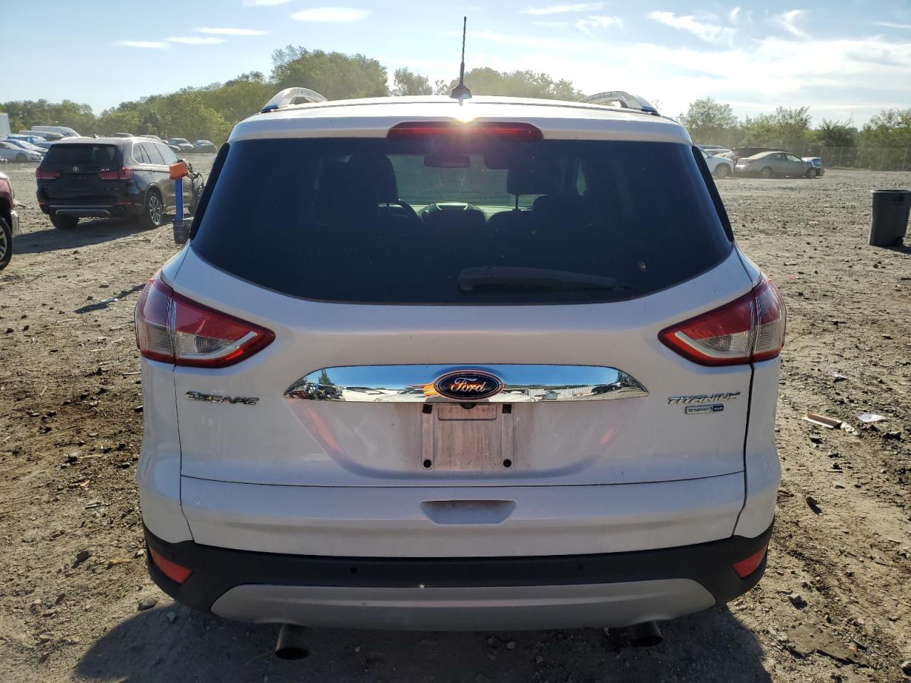 2014 Ford Escape Titanium VIN: 1FMCU9J90EUD74137 Lot: 82043375