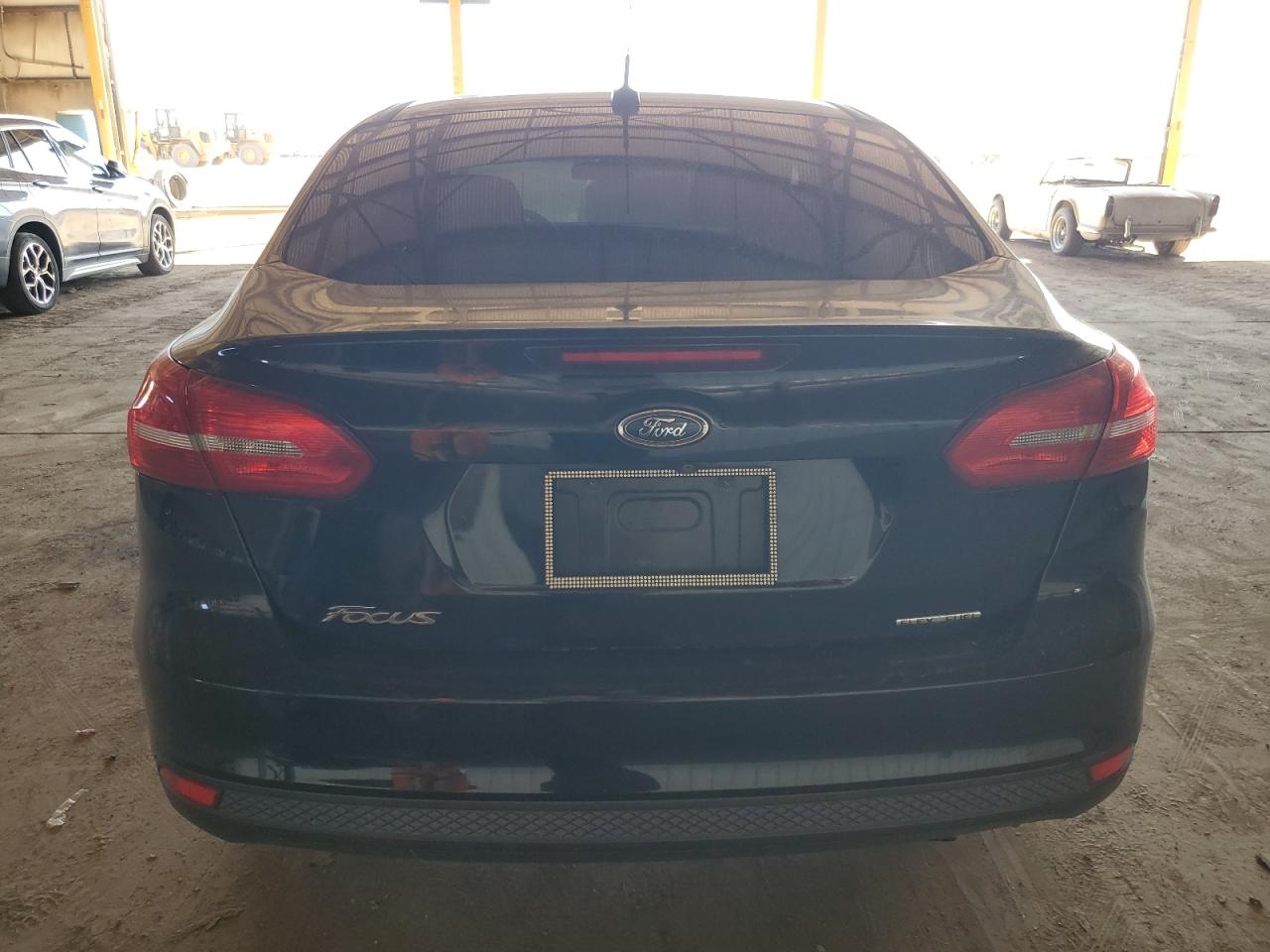 2015 Ford Focus S VIN: 1FADP3E24FL269558 Lot: 85146075