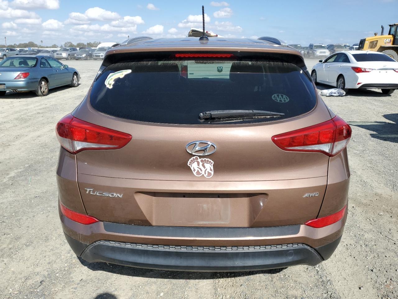 2016 Hyundai Tucson Limited VIN: KM8J3CA43GU158541 Lot: 82295805