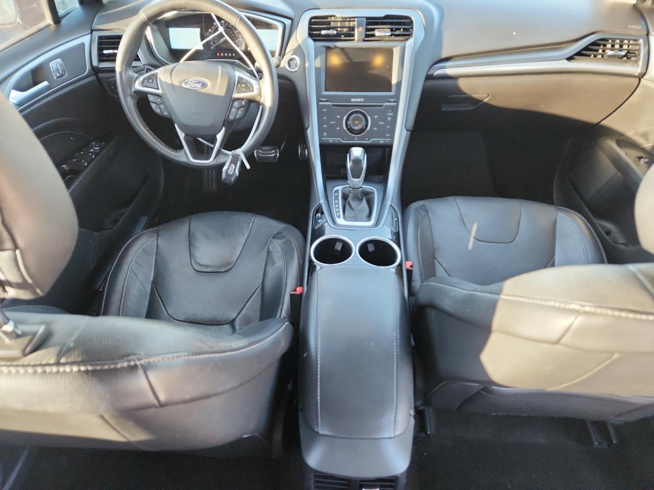 2014 Ford Fusion Titanium VIN: 3FA6P0K97ER143154 Lot: 85849705