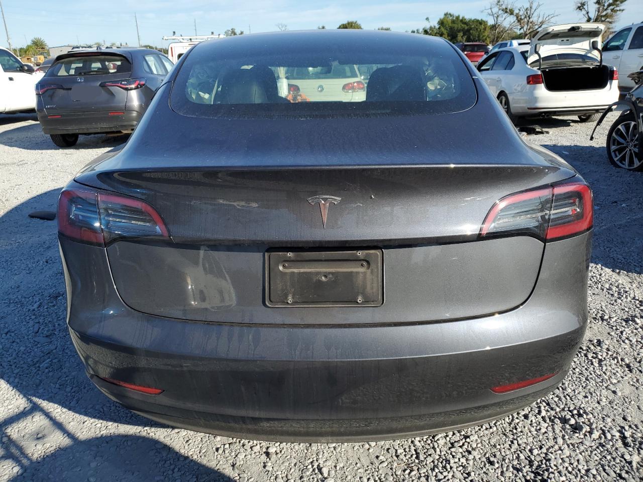 2023 Tesla Model 3 VIN: 5YJ3E1EA4PF693723 Lot: 90037275