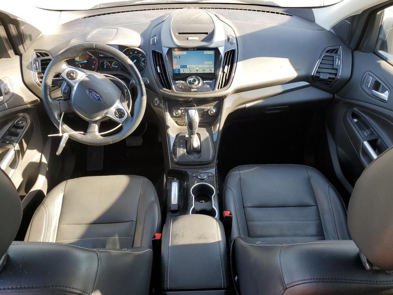 2016 Ford Escape Titanium VIN: 1FMCU9J99GUB59617 Lot: 86448225