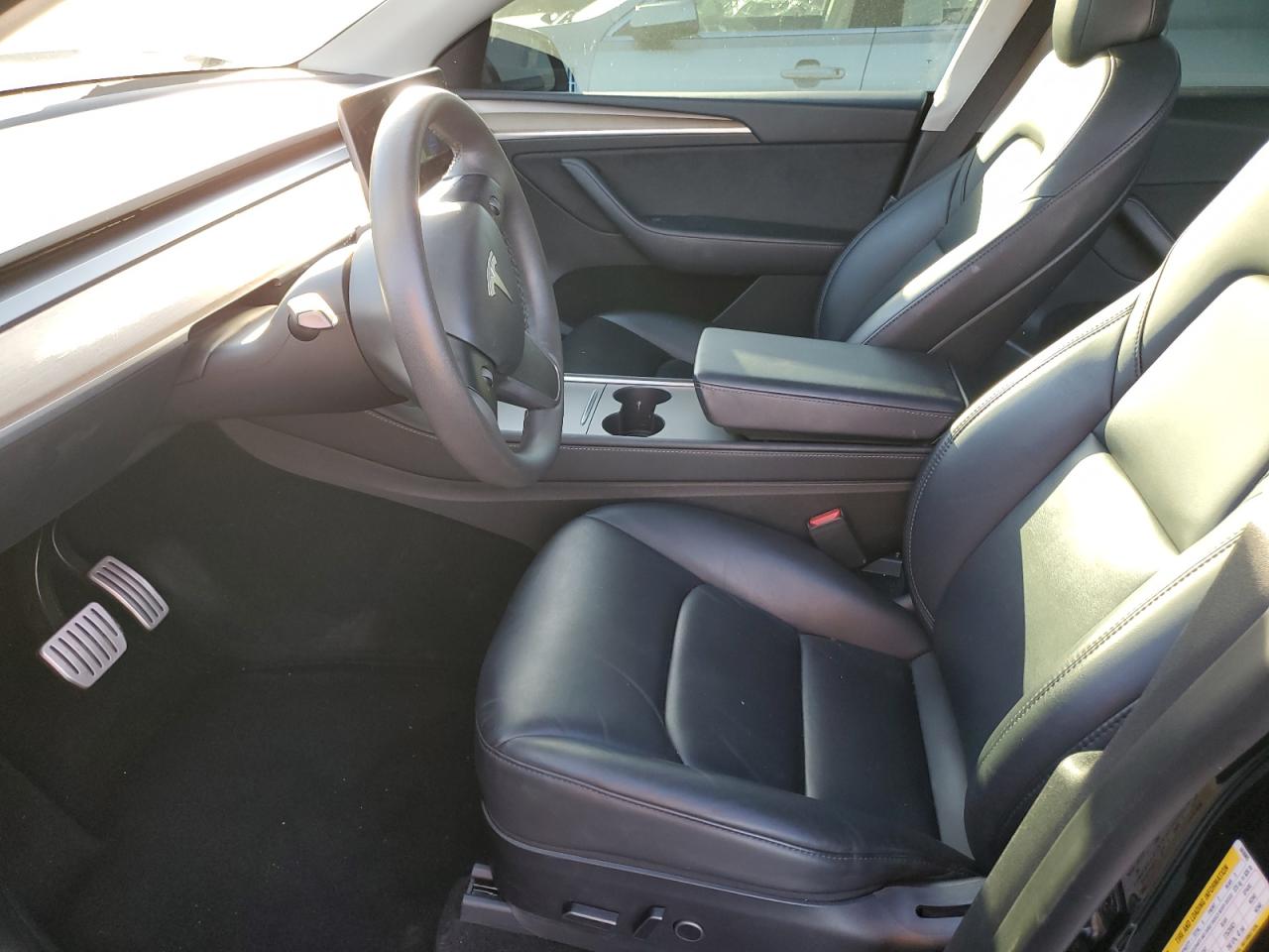 2023 Tesla Model Y VIN: 7SAYGDEF1PF665085 Lot: 82635915