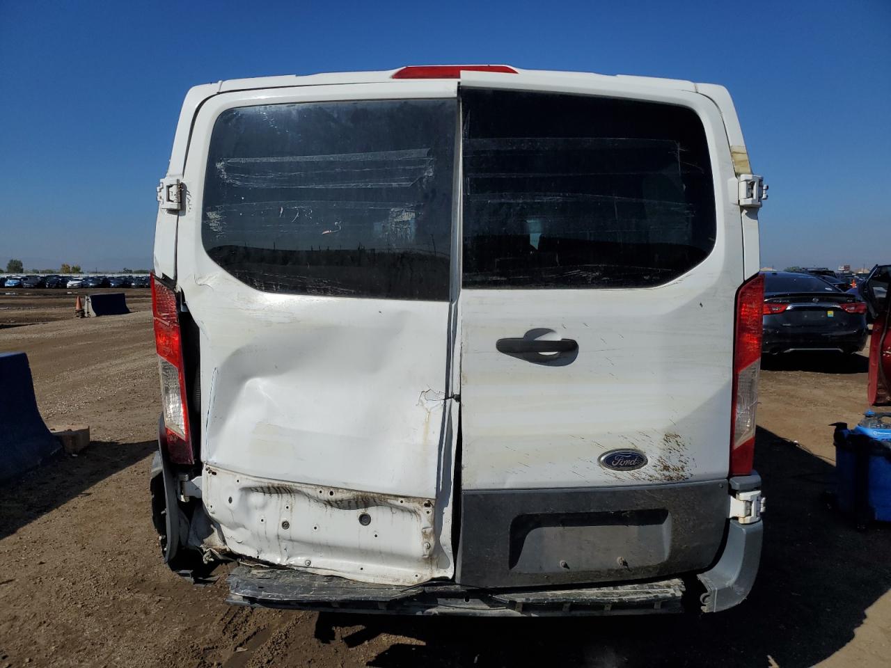 2015 Ford Transit T-150 VIN: 1FMZK1ZMXFKB27604 Lot: 85929745