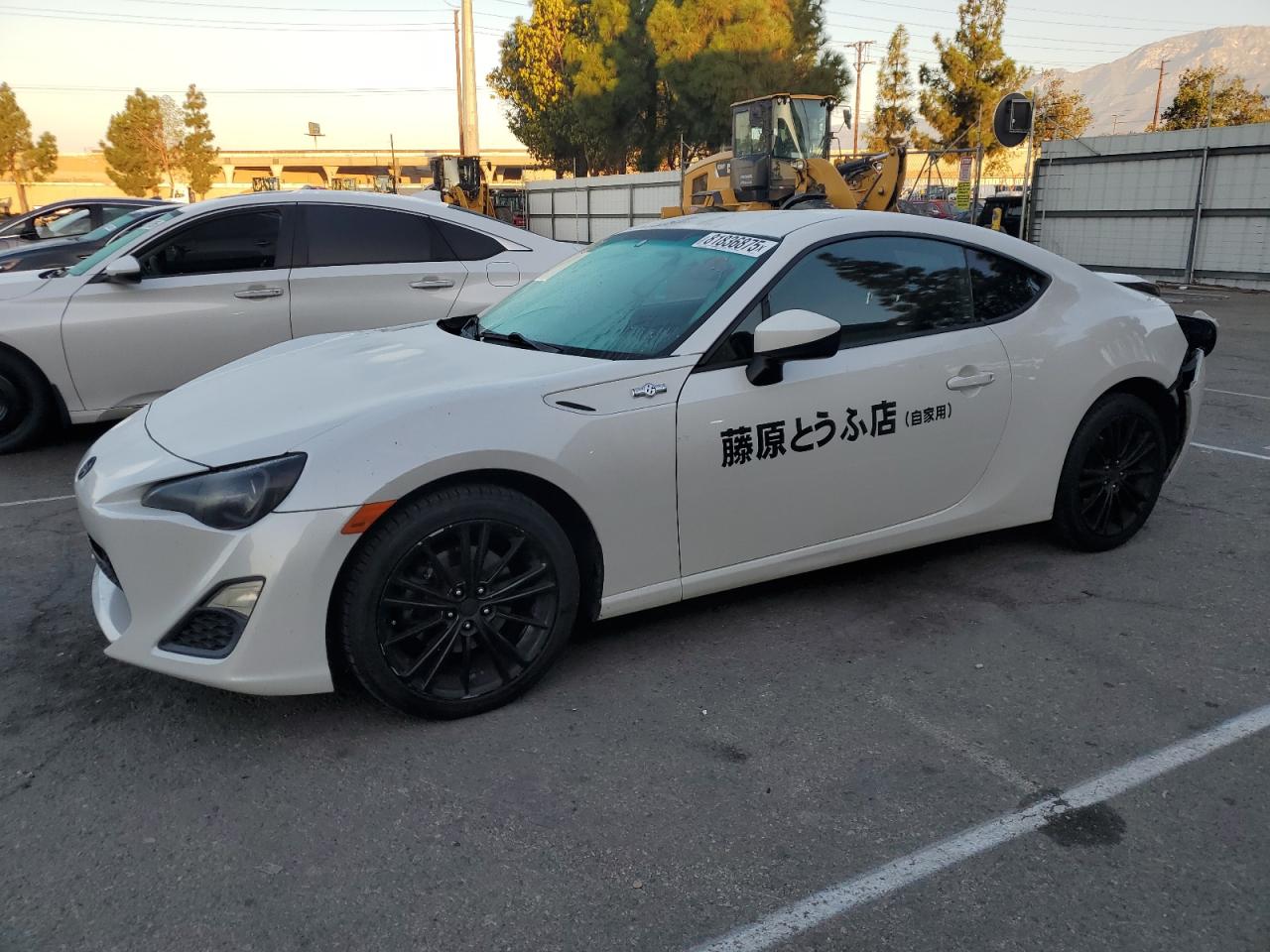 TOYOTA SCION 2013. Lot# 81836875. VIN JF1ZNAA1XD2714417. Photo 1