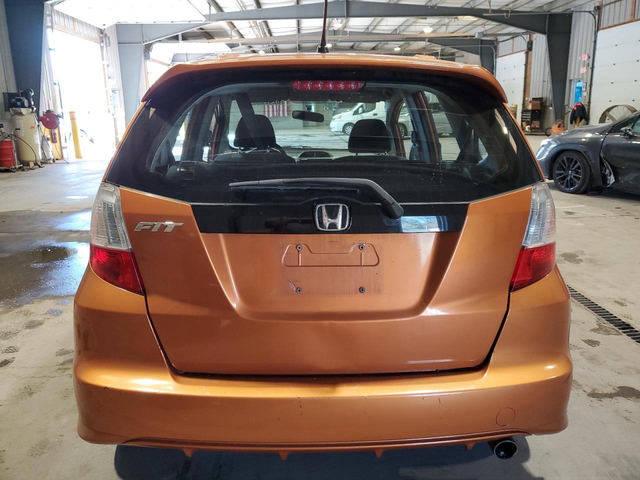 2009 Honda Fit Sport VIN: JHMGE884X9S025297 Lot: 82420025