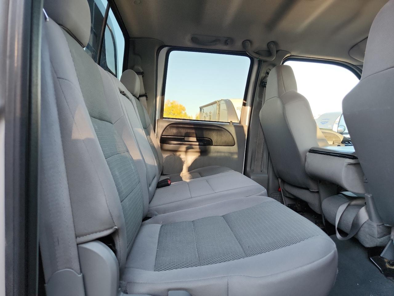 2005 Ford F250 Super Duty Flatbed Truck VIN: 1FTSW21P85EC83319 Lot: 90458725