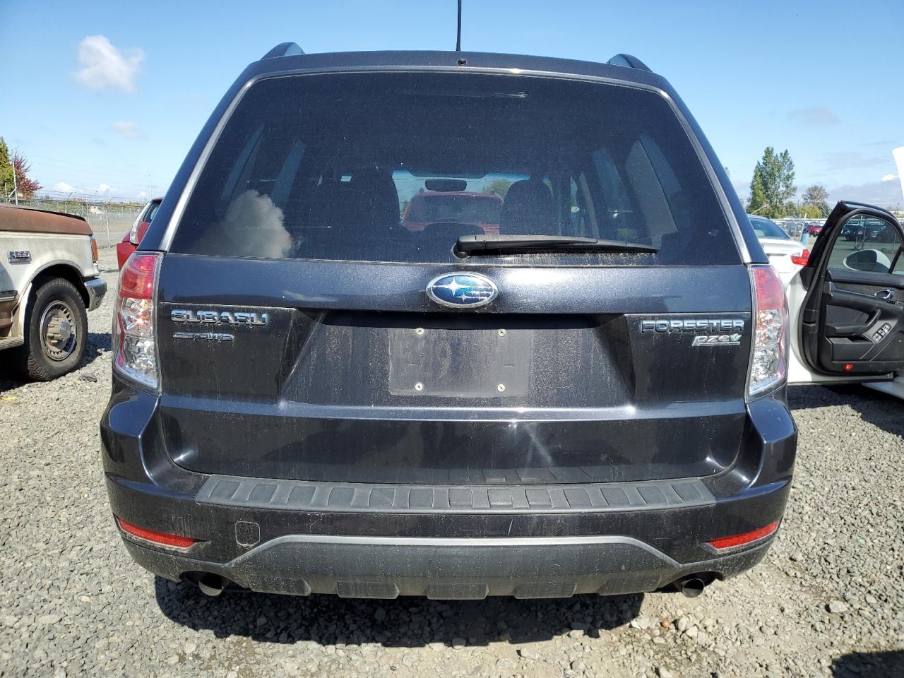 2011 Subaru Forester 2.5X Premium VIN: JF2SHADC4BH774785 Lot: 82180905