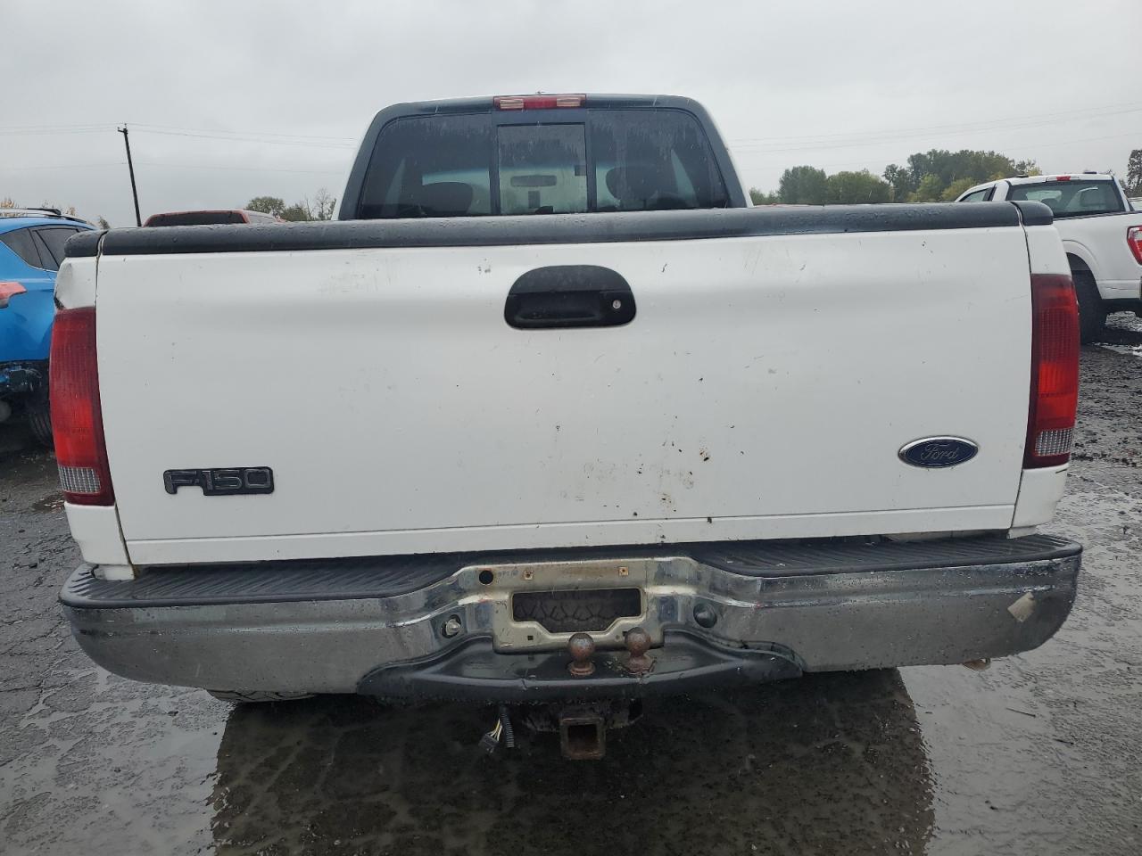 2002 Ford F150 VIN: 1FTRX18L12NA58230 Lot: 82699215