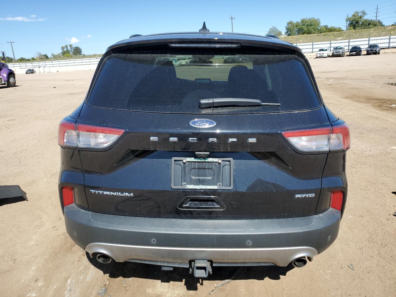 2021 Ford Escape Titanium VIN: 1FMCU9J90MUB15890 Lot: 85142605