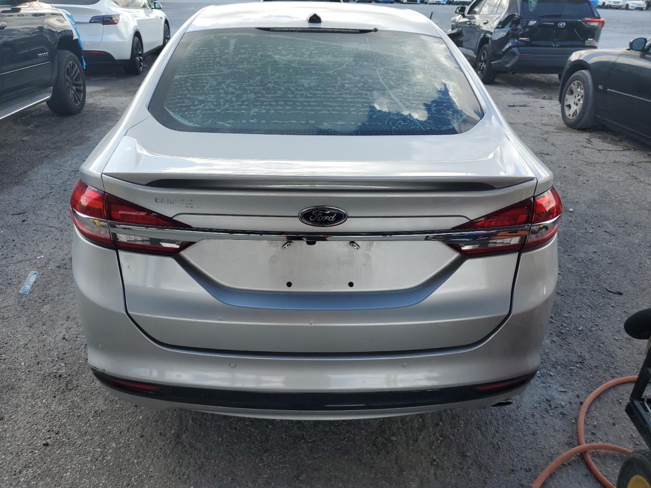 2017 Ford Fusion Titanium Phev VIN: 3FA6P0SU5HR209693 Lot: 84644695