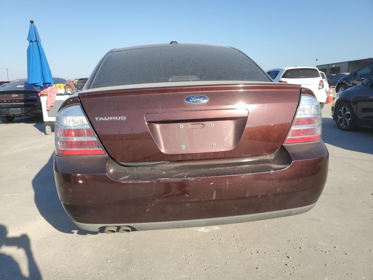 2009 Ford Taurus Se VIN: 1FAHP23W69G105663 Lot: 87094655