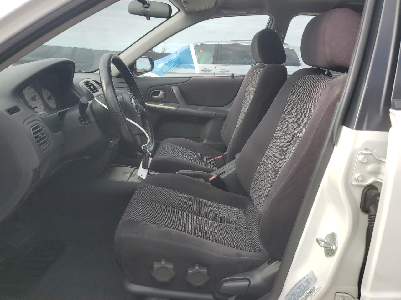 2002 Mazda Protege Pr5 VIN: JM1BJ245321584219 Lot: 84994635