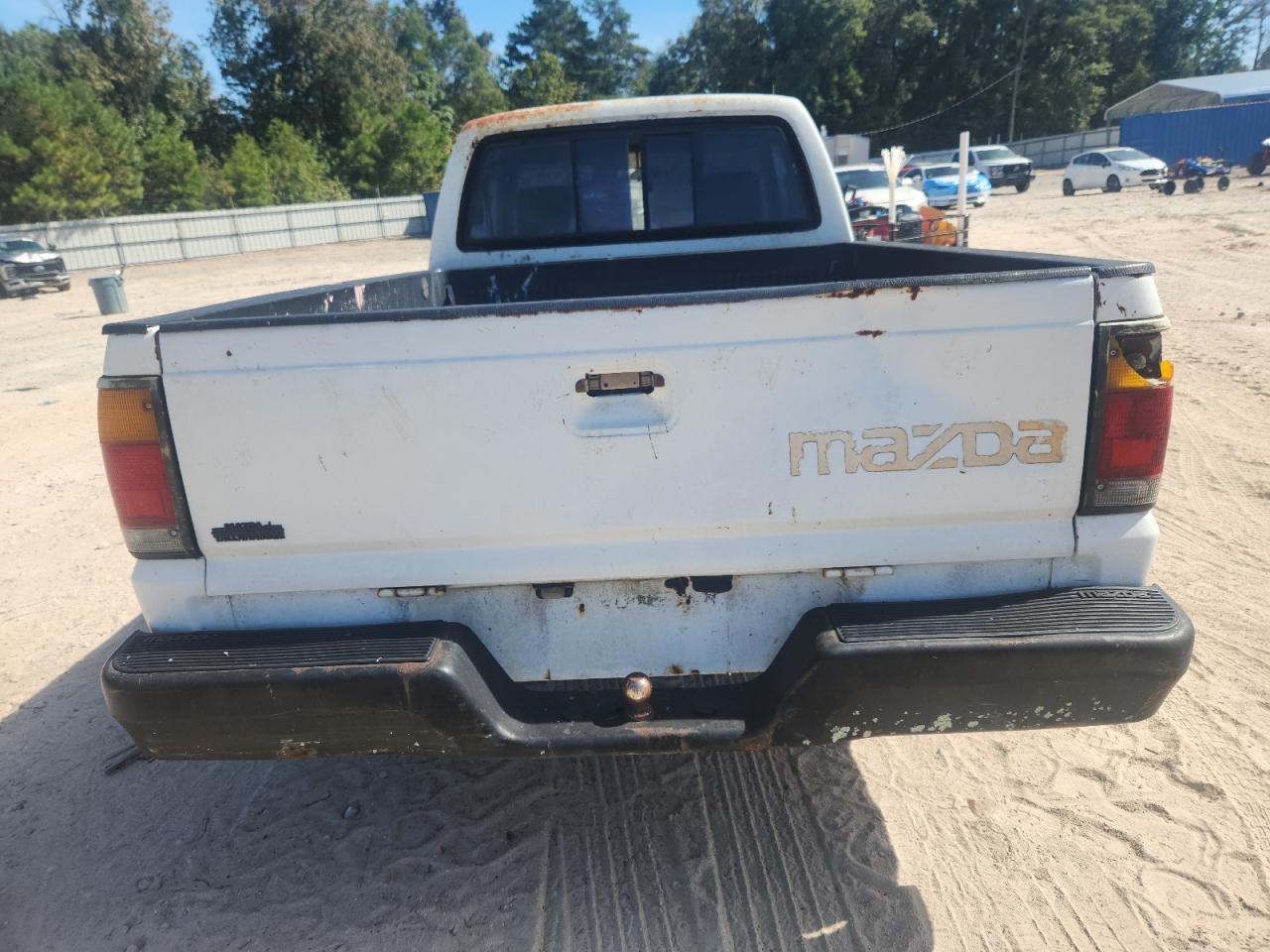 1991 Mazda B2600 Cab Plus VIN: JM2UF3146M0142275 Lot: 90036395