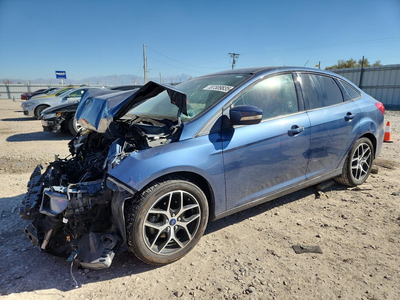 FORD FOCUS 2018. Lot# 87309835. VIN 1FADP3H24JL217383. Photo 1