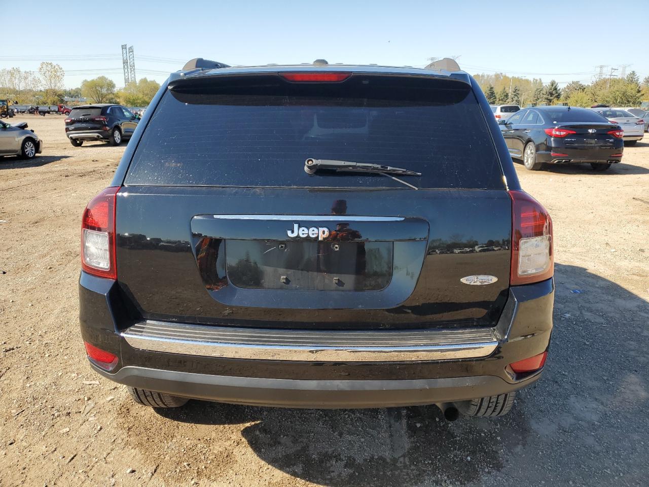 2015 Jeep Compass Latitude VIN: 1C4NJCEA0FD106987 Lot: 85693515