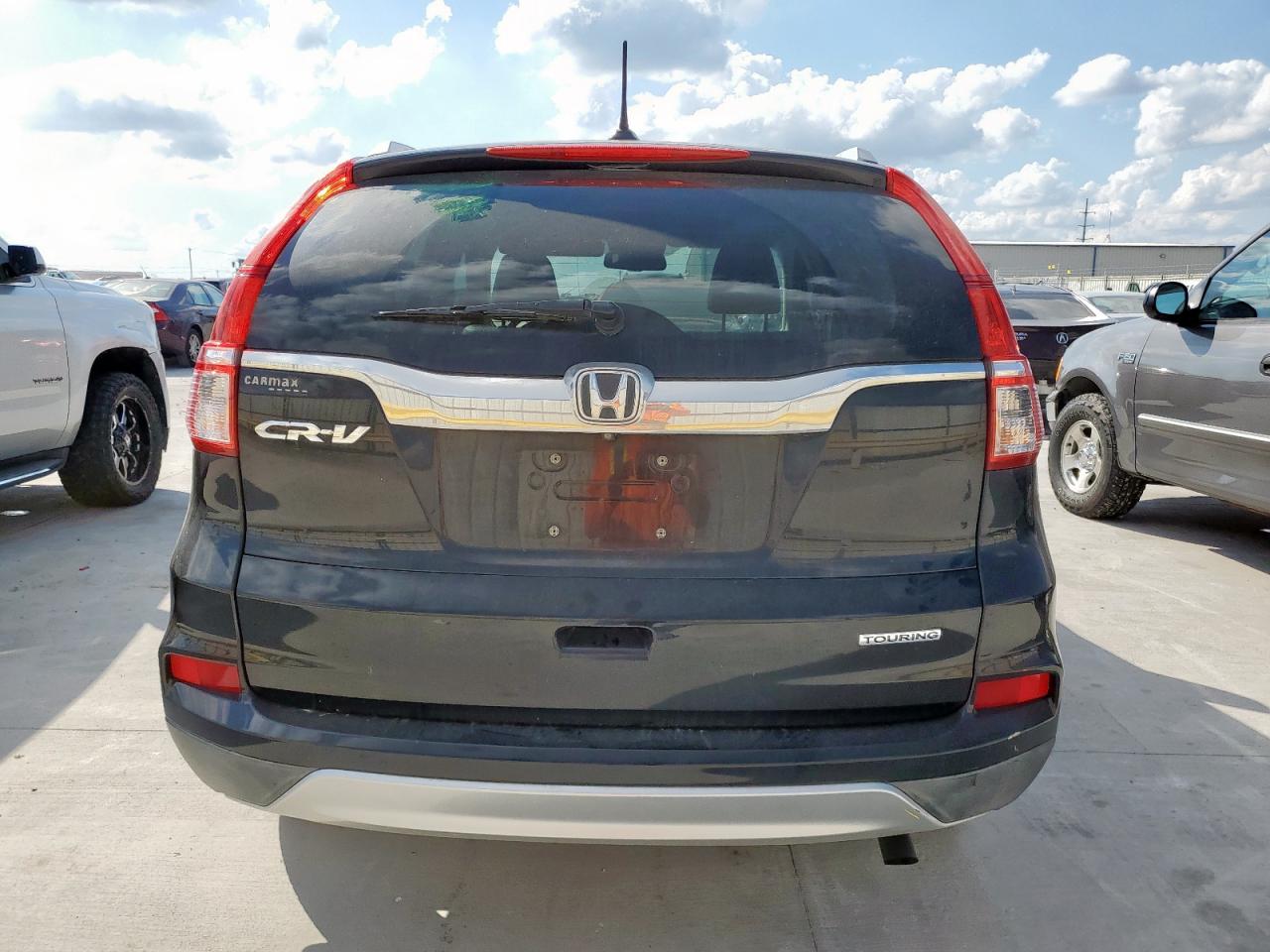 2016 Honda Cr-V Touring VIN: 5J6RM3H96GL001169 Lot: 85364545
