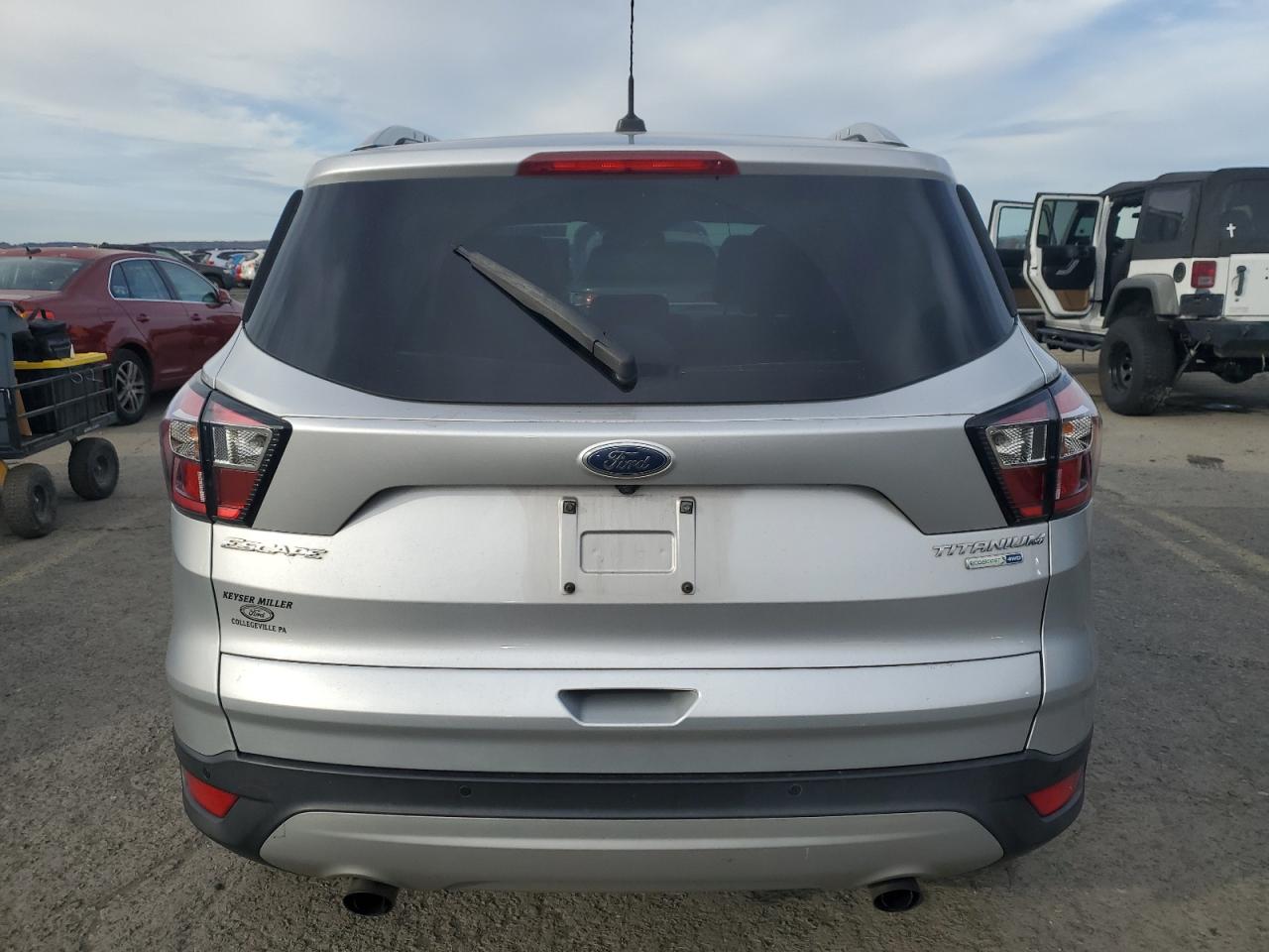 2017 Ford Escape Titanium VIN: 1FMCU9J99HUC92377 Lot: 90405105
