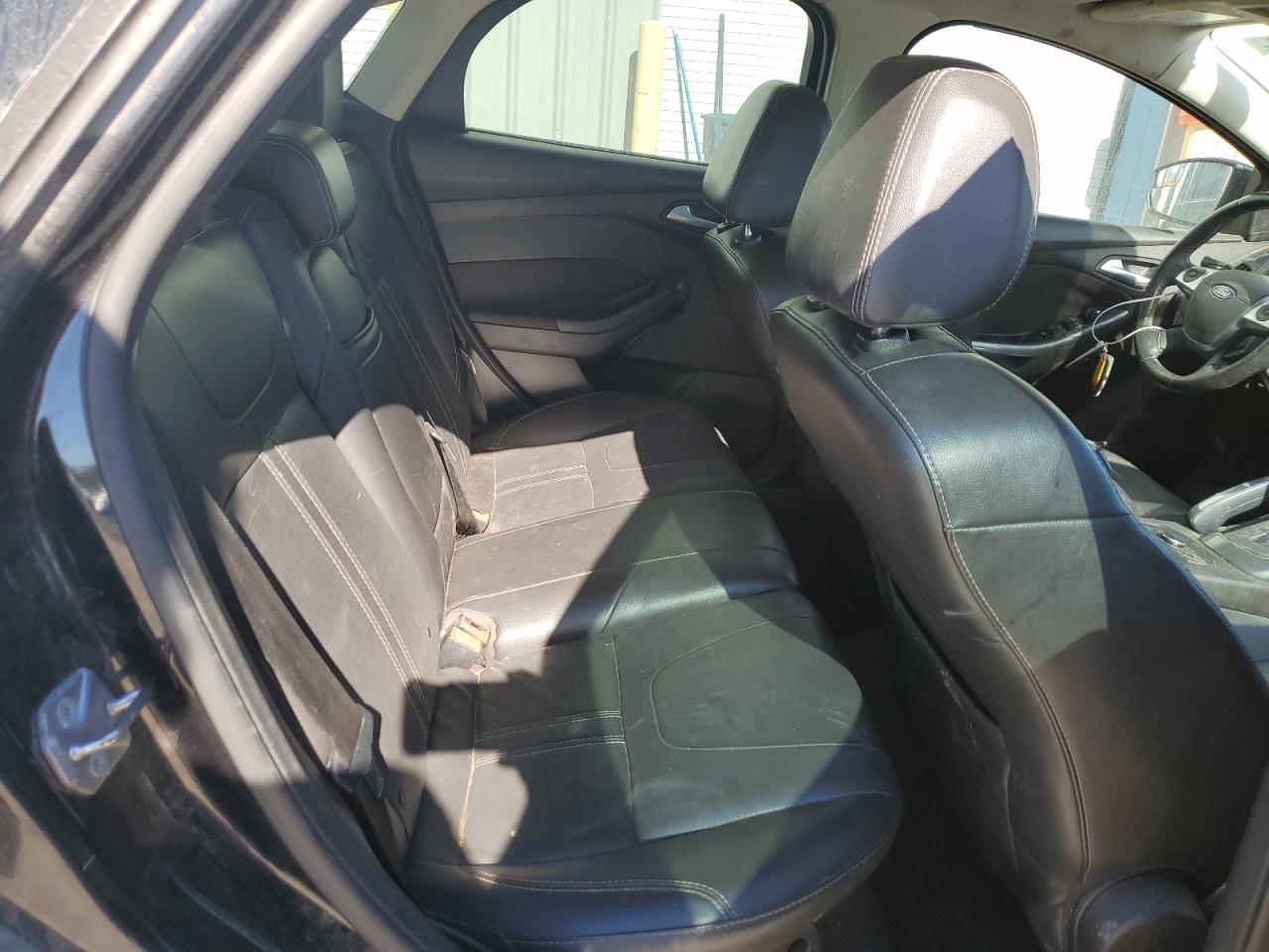 2013 Ford Focus Titanium VIN: 1FADP3J24DL263424 Lot: 85682495