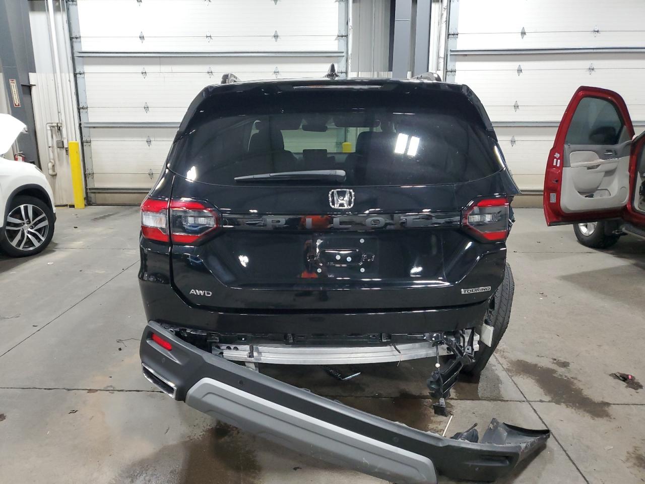 2023 Honda Pilot Touring VIN: 5FNYG1H73PB014749 Lot: 85844275