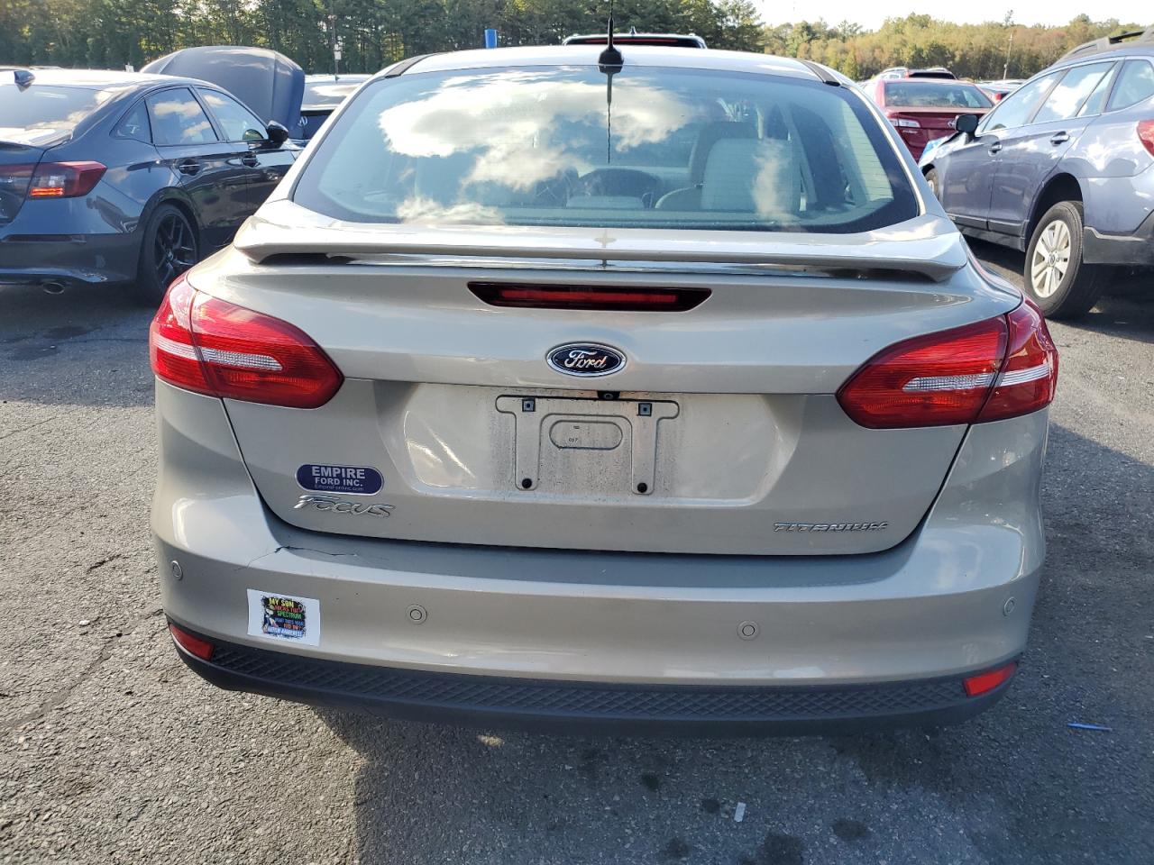2015 Ford Focus Titanium VIN: 1FADP3J2XFL226736 Lot: 84420675