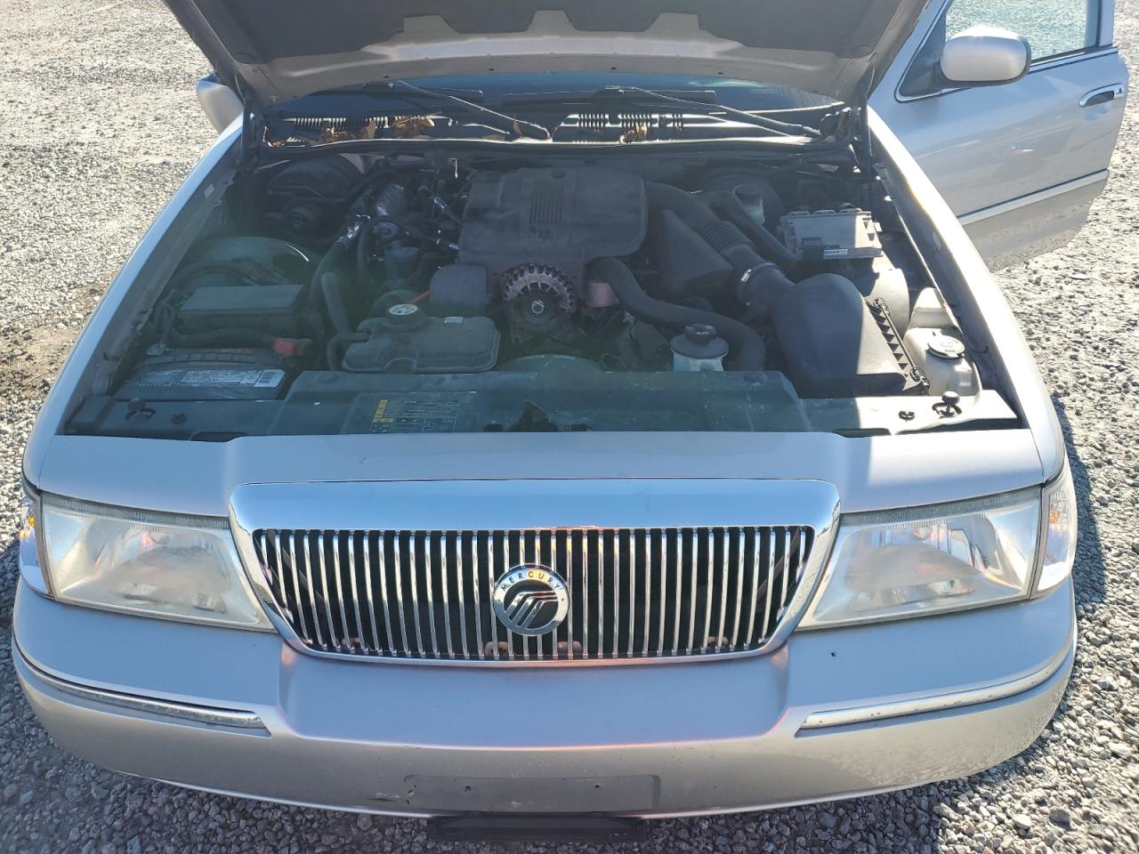 2005 Mercury Grand Marquis Gs VIN: 2MEFM74W95X660597 Lot: 89587335