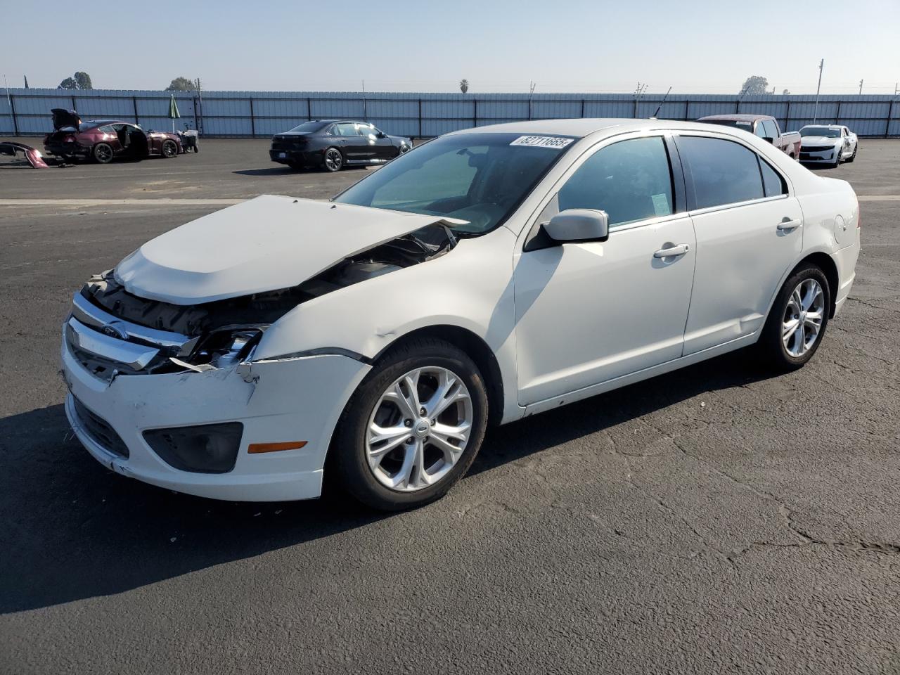 FORD FUSION 2012. Lot# 82711665. VIN 3FAHP0HA0CR365770. Photo 1