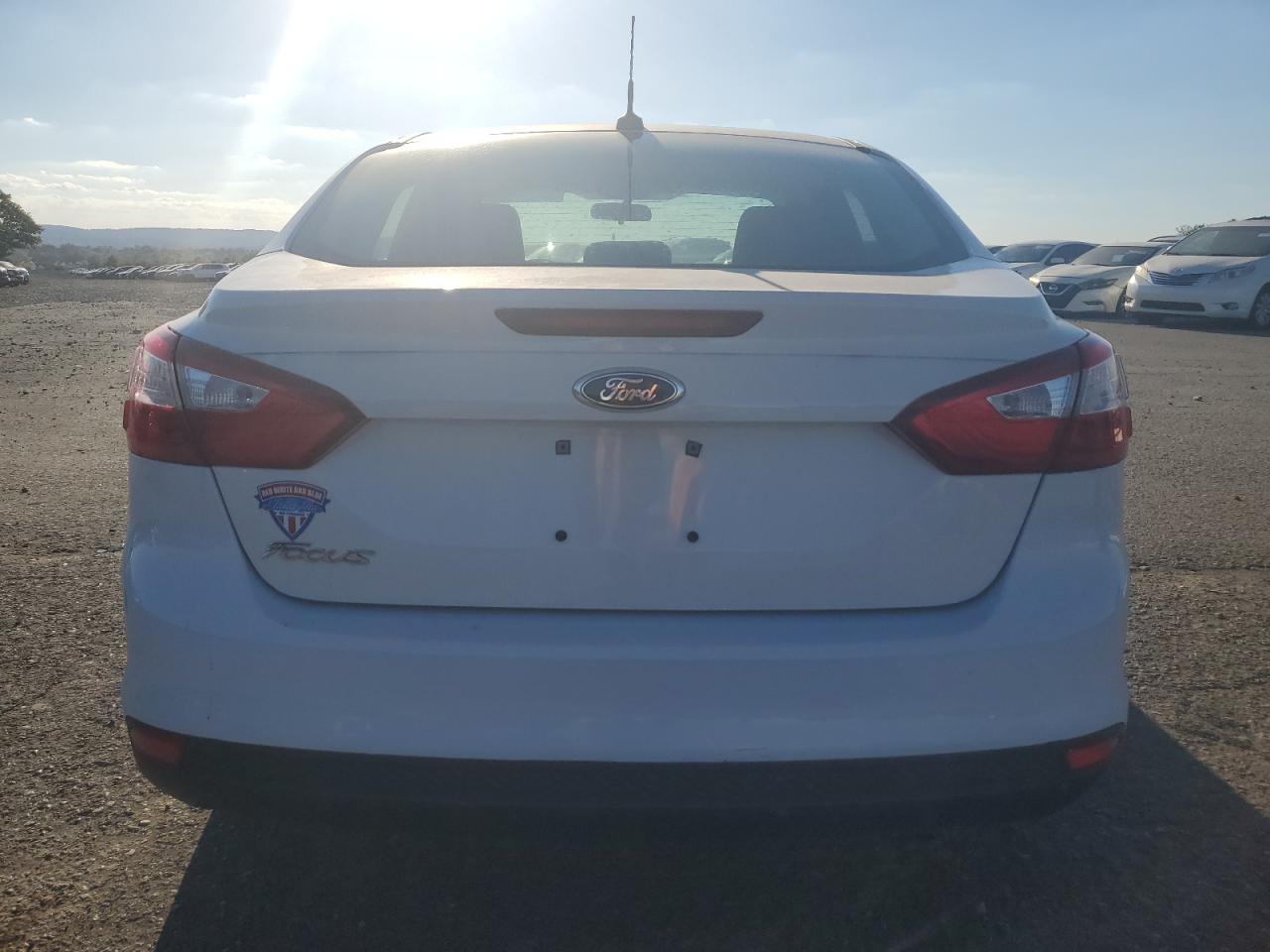 2012 Ford Focus S VIN: 1FAHP3E24CL461138 Lot: 85151625