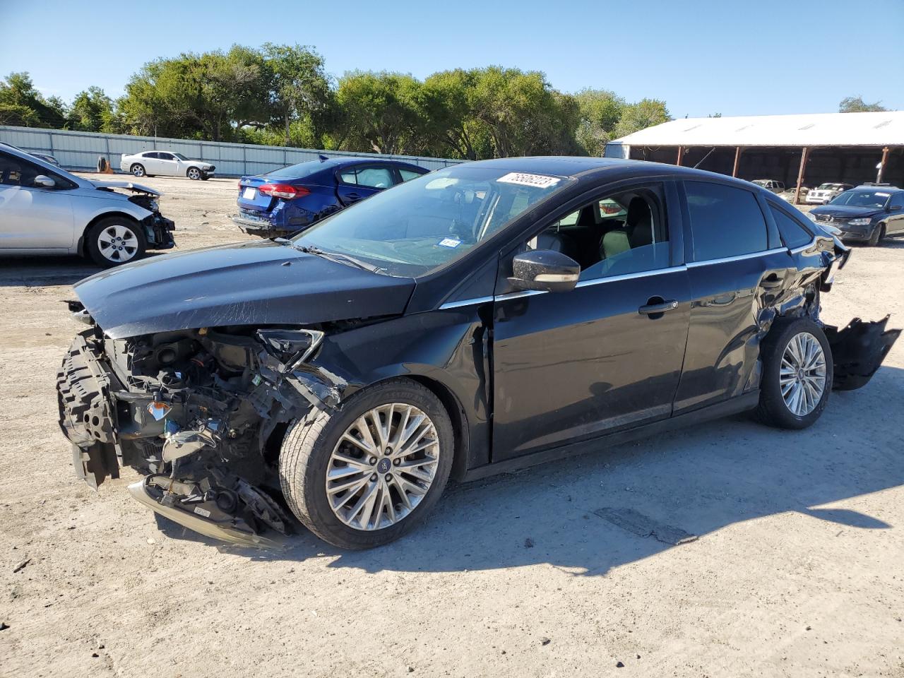 2017 Ford Focus Titanium VIN: 1FADP3J24HL288247 Lot: 76506223