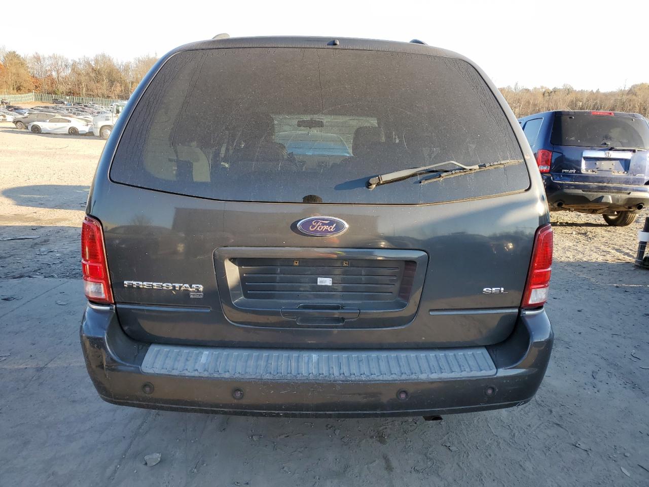 2007 Ford Freestar Sel VIN: 2FMZA52217BA08810 Lot: 56502374