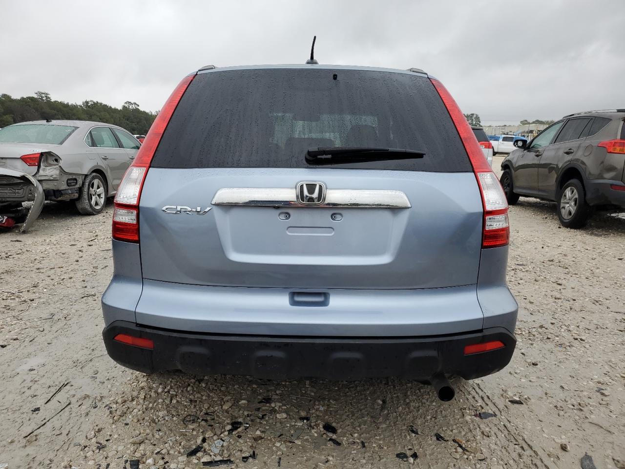 2009 Honda Cr-V Exl VIN: JHLRE38729C009812 Lot: 75900523