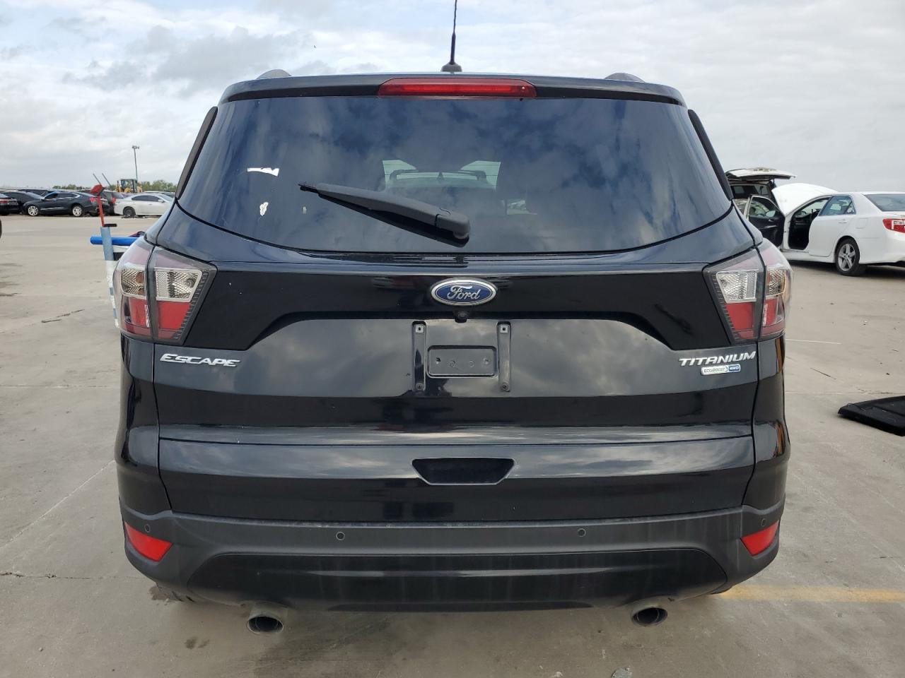 2017 Ford Escape Titanium VIN: 1FMCU9JD4HUB40494 Lot: 79087034