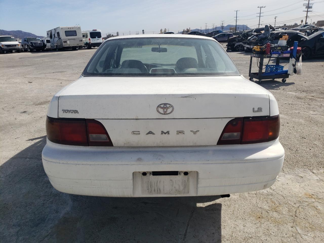 1995 Toyota Camry Le VIN: 4T1SK12E9SU614148 Lot: 79503594