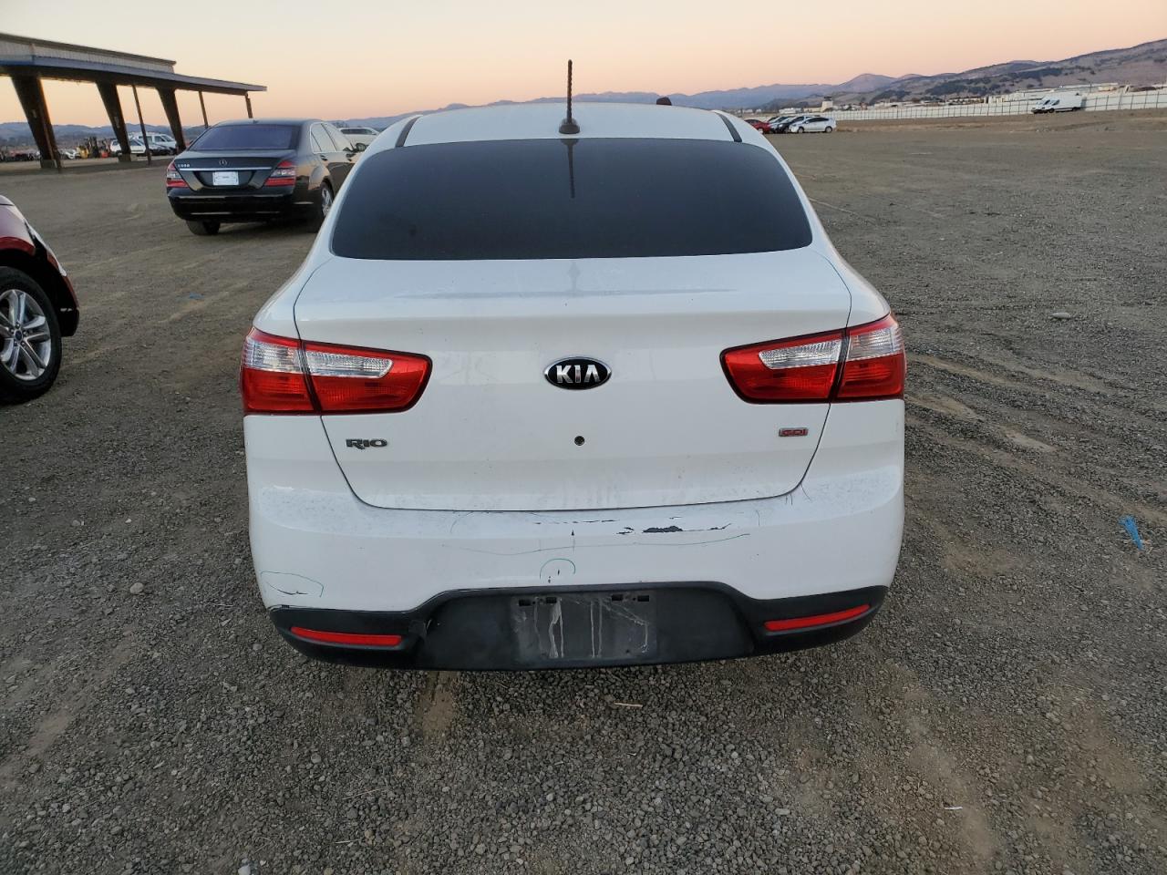 2013 Kia Rio Lx VIN: KNADM4A31D6240678 Lot: 79777294