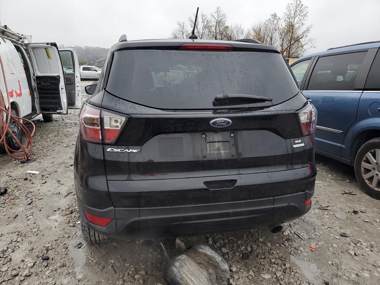 VIN 1FMCU0GD2JUB24769 2018 FORD ESCAPE no.6