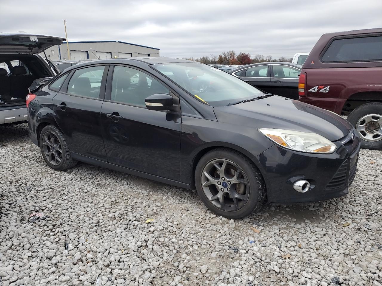 VIN 1FADP3F2XDL246152 2013 FORD FOCUS no.4